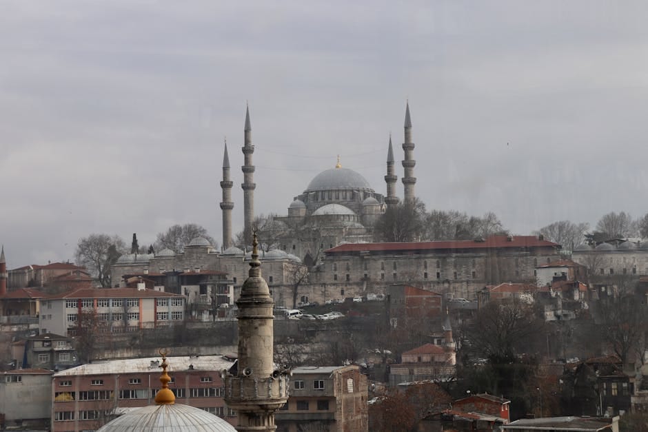 A striking cityscape of Istanbul featuring the iconic Suleymaniye Mosque in winter.
