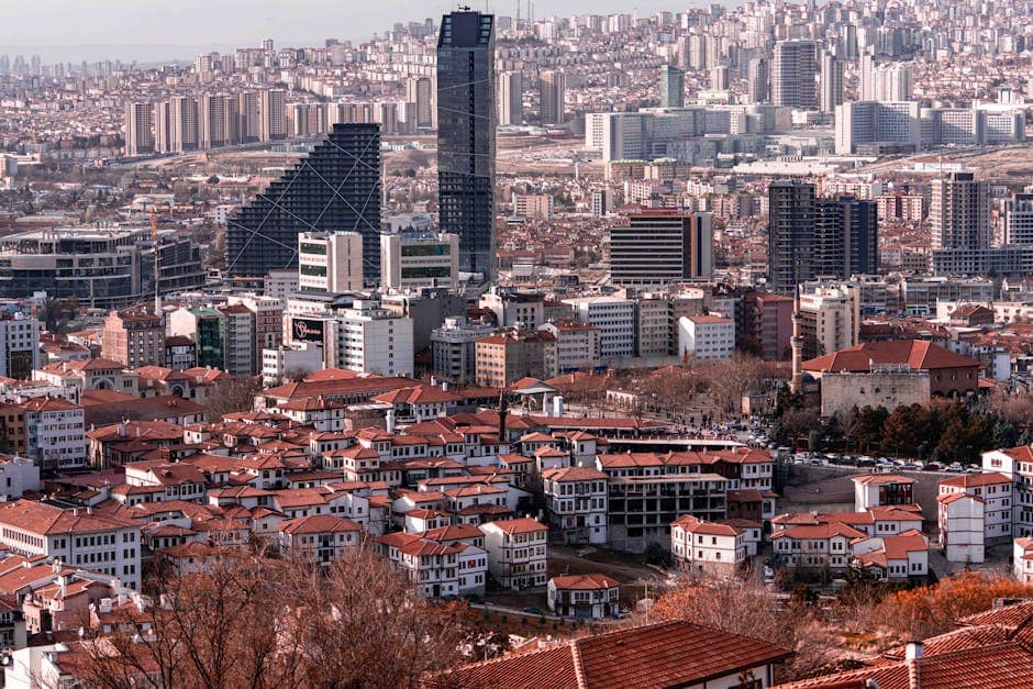 An expansive view of Ankara showcasing modern architecture against traditional rooftops.