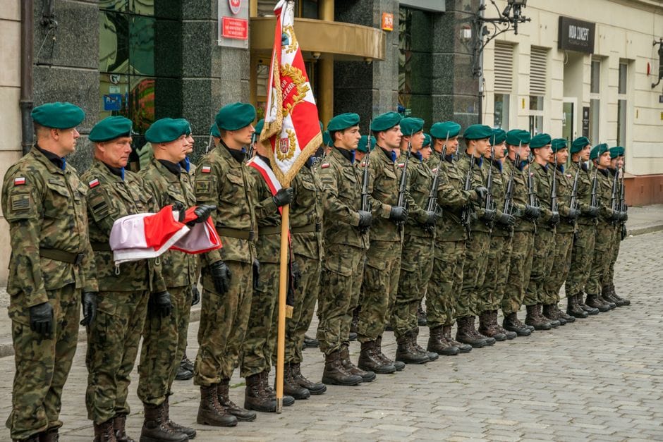 Polish soldiers in uniform during a ceremonial formation in Wrocław, Poland.