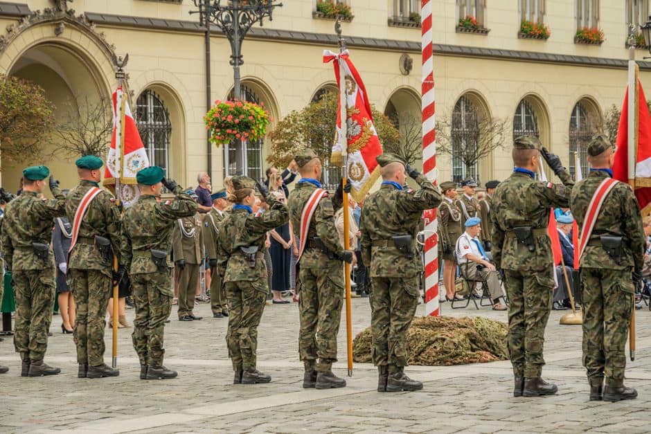 Polish soldiers in military uniforms at a formal parade in Wrocław, showcasing national pride and ceremonial display.