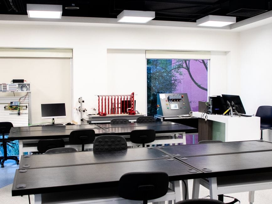 Contemporary lab interior with desks and equipment, perfect for educational purposes.