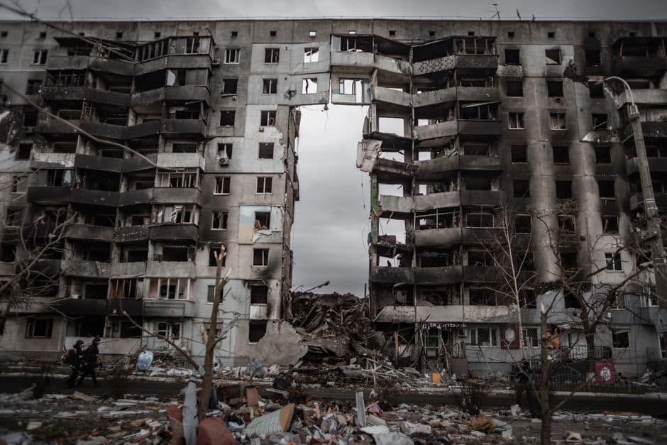 A destroyed apartment building in Borodyanka, Ukraine, showing aftermath of conflict.